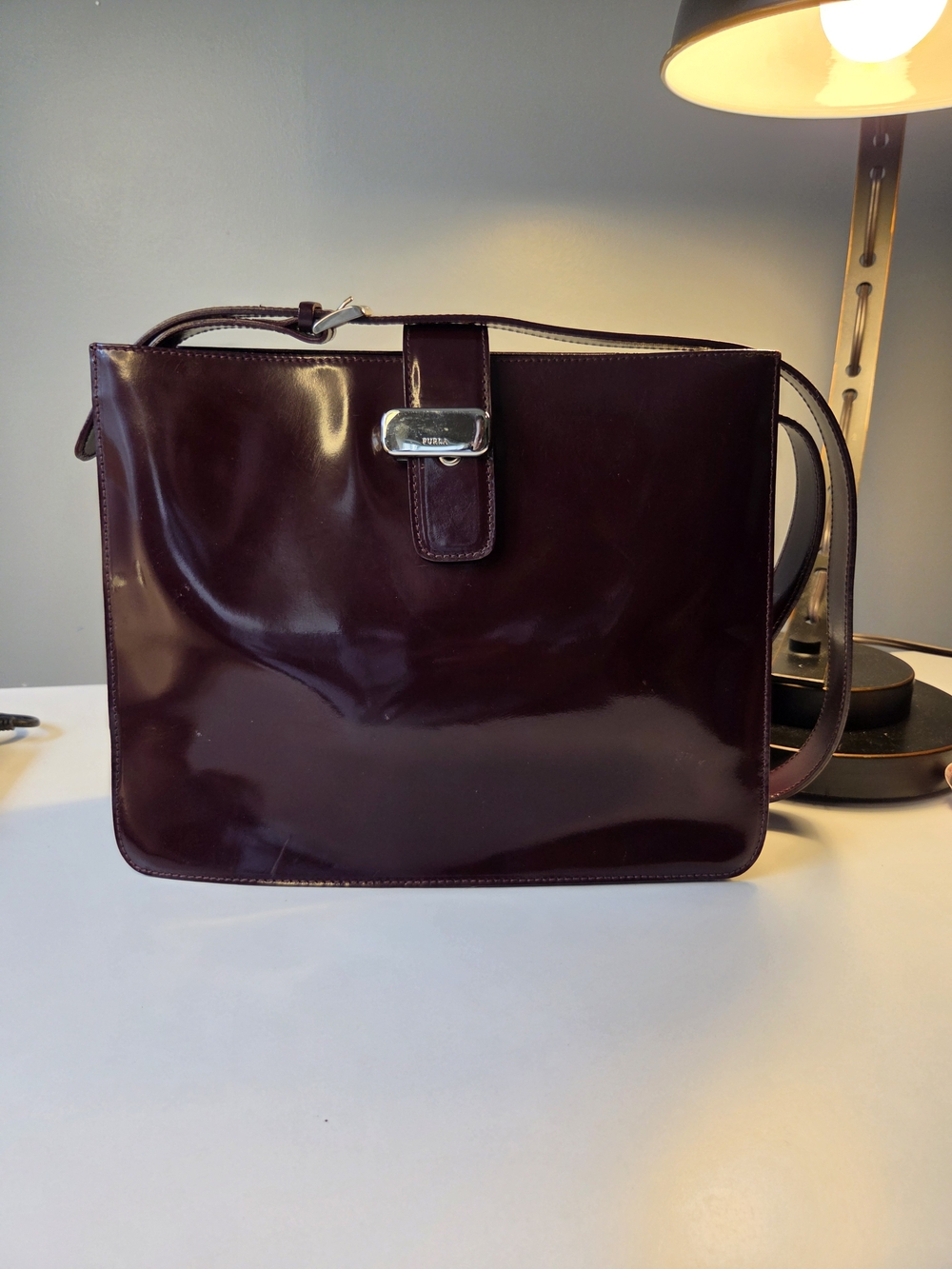 vintage Furla shoulder bag crafted from burgundy patent leather